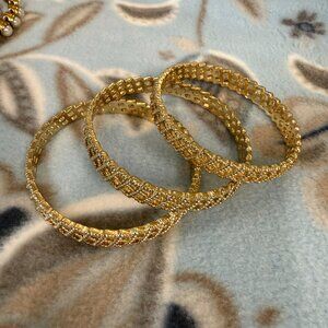 Set of 3-Beautiful Gold Tone Bangle Bracelets.